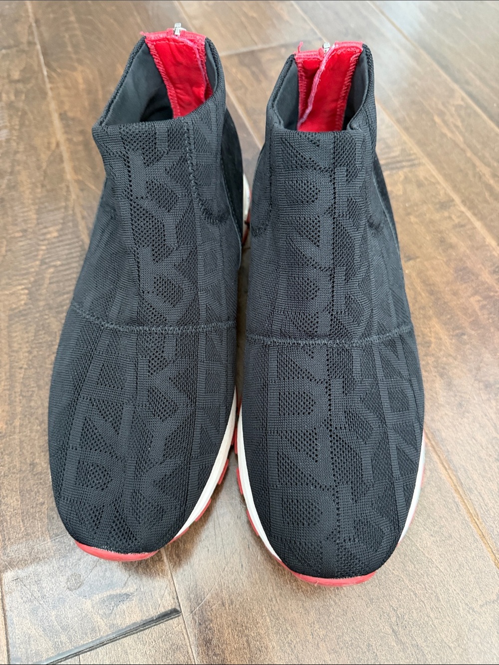 DKNY Black Knit Slip-On Sneakers with Red Pull-Tab and Accents